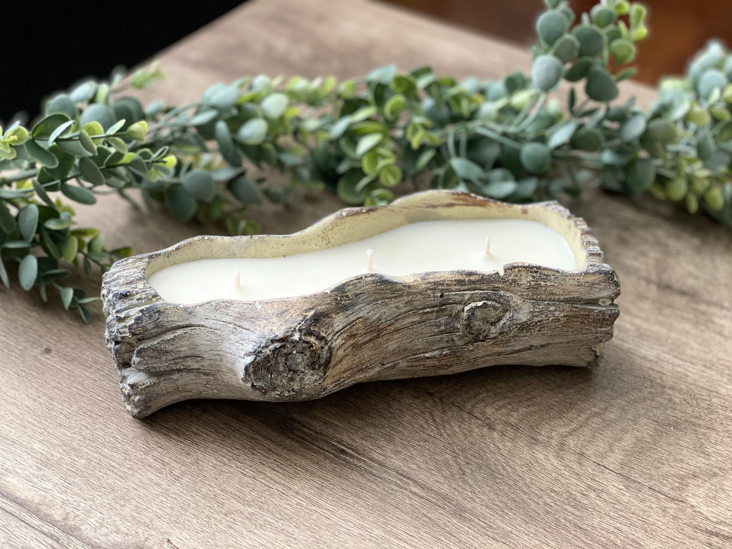 Cement Tree Log Decor Candle | Sea Salt & Orchids | 12 oz. sea salt, lily of the valley, wood. A unique piece of home decor that works perfectly for indoor and outdoor space. When you finished the candle, this cement log can be used as planter, serving dish and decorative holder. Bluffton Candles - The Bluffton Shop - Gift Shops