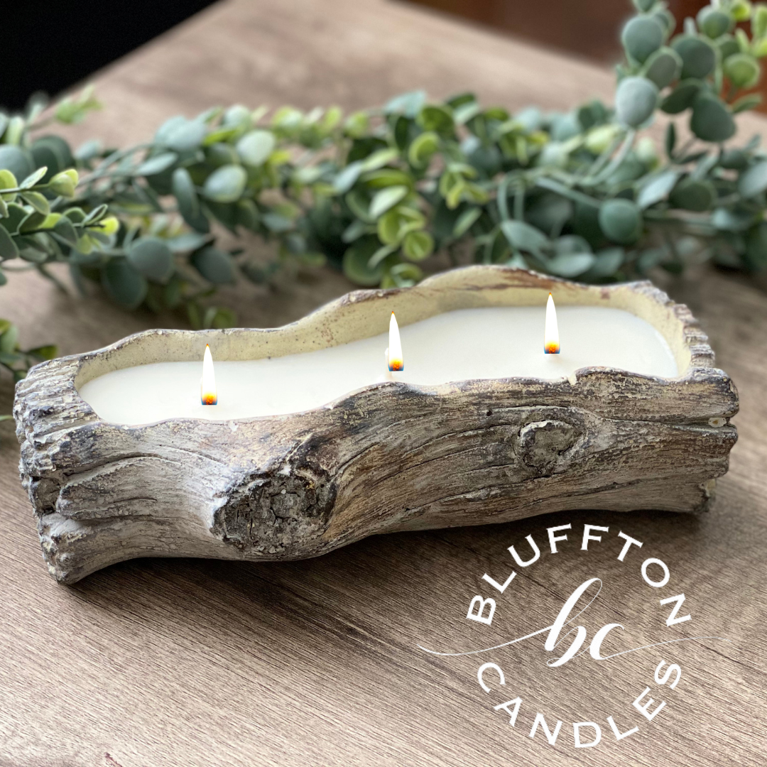 Cement Tree Log Decor Candle | Sea Salt & Orchids | 12 oz. sea salt, lily of the valley, wood. A unique piece of home decor that works perfectly for indoor and outdoor space. When you finished the candle, this cement log can be used as planter, serving dish and decorative holder. Bluffton Candles - The Bluffton Shop - Gift Shops