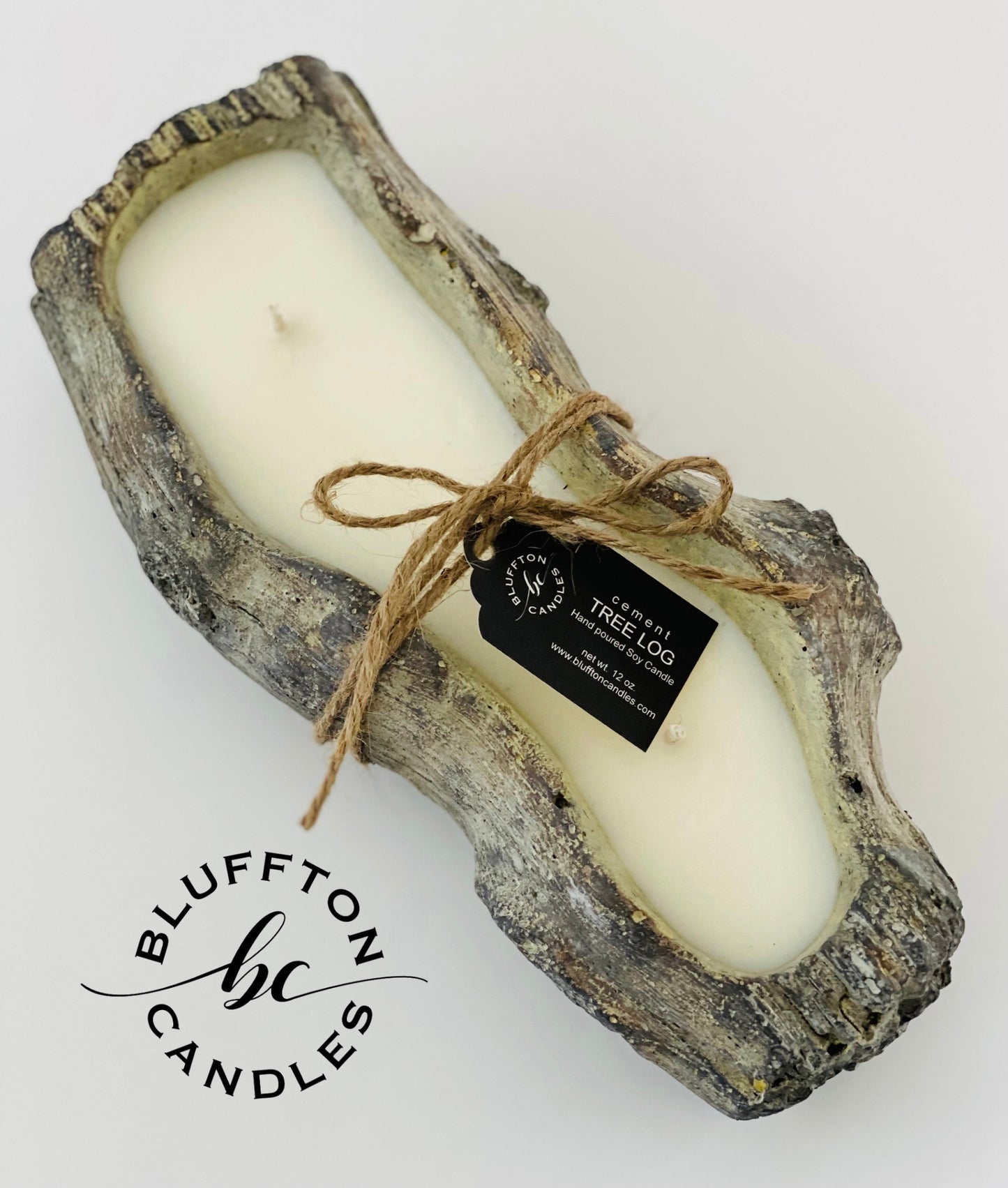 Cement Tree Log Decor Candle | Sea Salt & Orchids | 12 oz. sea salt, lily of the valley, wood. A unique piece of home decor that works perfectly for indoor and outdoor space. When you finished the candle, this cement log can be used as planter, serving dish and decorative holder. Bluffton Candles - The Bluffton Shop - Gift Shops